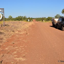 Changing country at the Shire sign