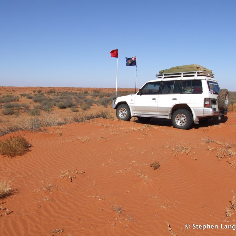 Surveying for an easier way down this virgin dune