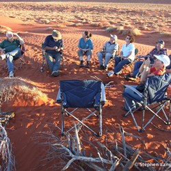 High above us, a plane carries its passengers in comfort, while we are stick in what we could describe as Hell