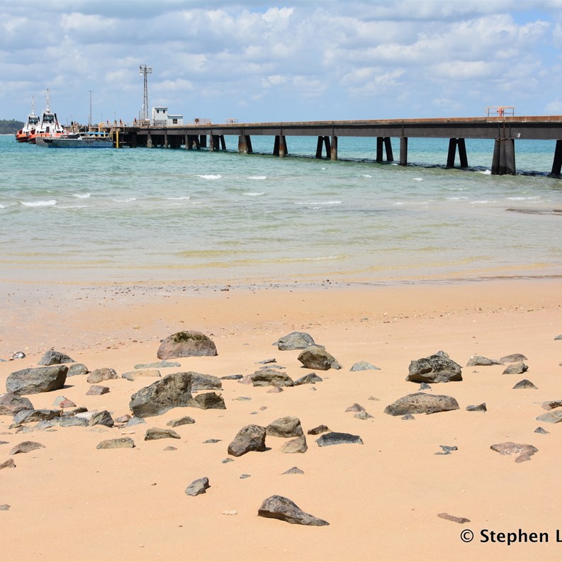 The Wharf area with a Customs boat at the end of the wharf