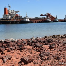 The bauxite is loaded directly onto the waiting ships