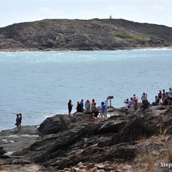 Crowds lined up to get that ever important photo by that special sign