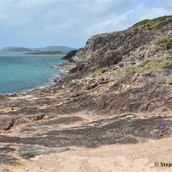 Rugged coastal scenery on the eastern side of the Tip