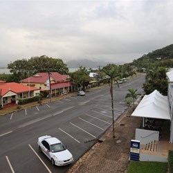 Our view of a grey Cooktown main street from our hotel room balcony