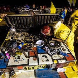 Late at night and still working on the Fiat.  Photo: Kelvin Woods/Russell Clayton