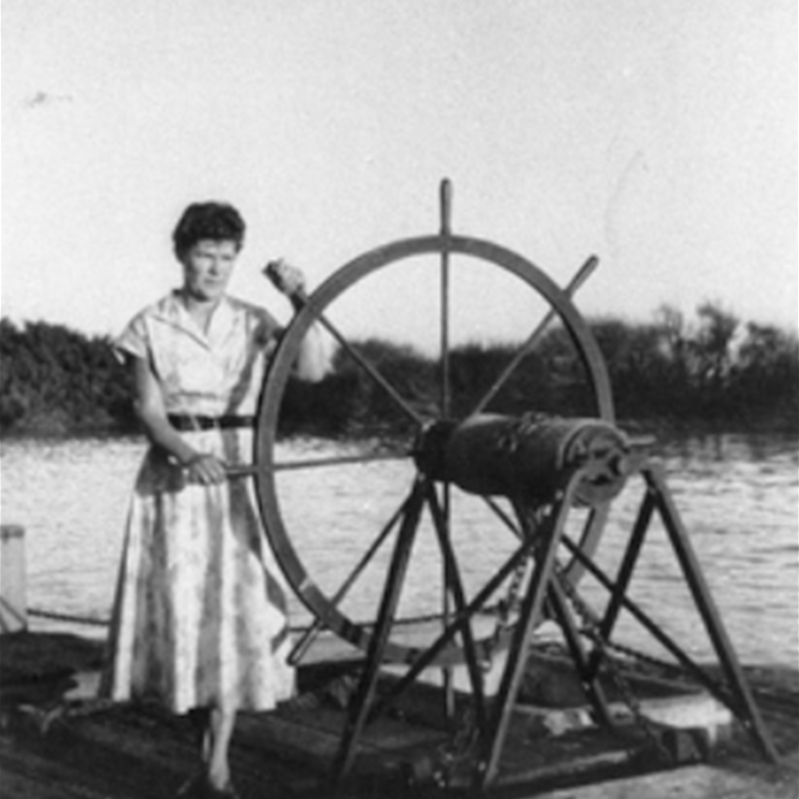 Captain Pearl Hogg at the wheel of the Agro barge.