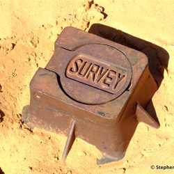 Survey marker at the site