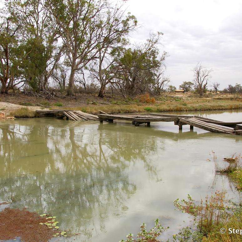 Old Stock crossing bridge from one island to another 