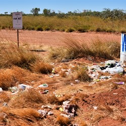 This is the WA / NT State Border Marker and the mess left by thoughtless travellers 