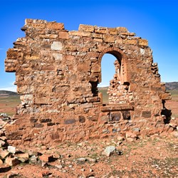 This old ruin is special with its arched window still in place