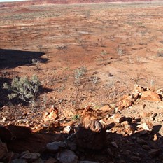 Gaby climbing the hill to the southern cave