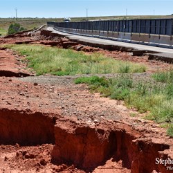 The damage to the Stuart Highway at Woocalla Creek.