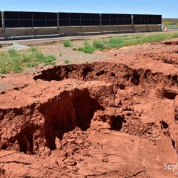 The damage to the Stuart Highway at Woocalla Creek.