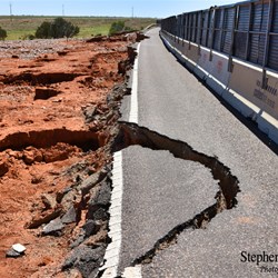 The damage to the Stuart Highway at Woocalla Creek.