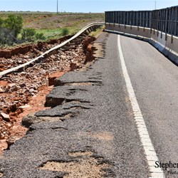 The damage to the Stuart Highway at Woocalla Creek.
