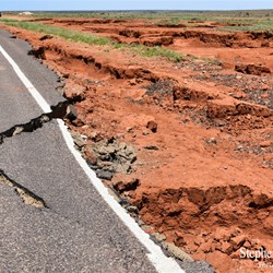 The damage to the Stuart Highway at Woocalla Creek.