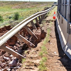 The damage to the Stuart Highway at Woocalla Creek.