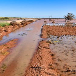 Floodwaters line the Stuart Highway at Glendambo.