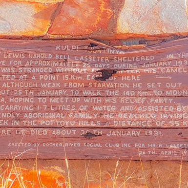 Signage at Lasseters Cave