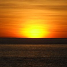 Sunset over the beach at Koojamon