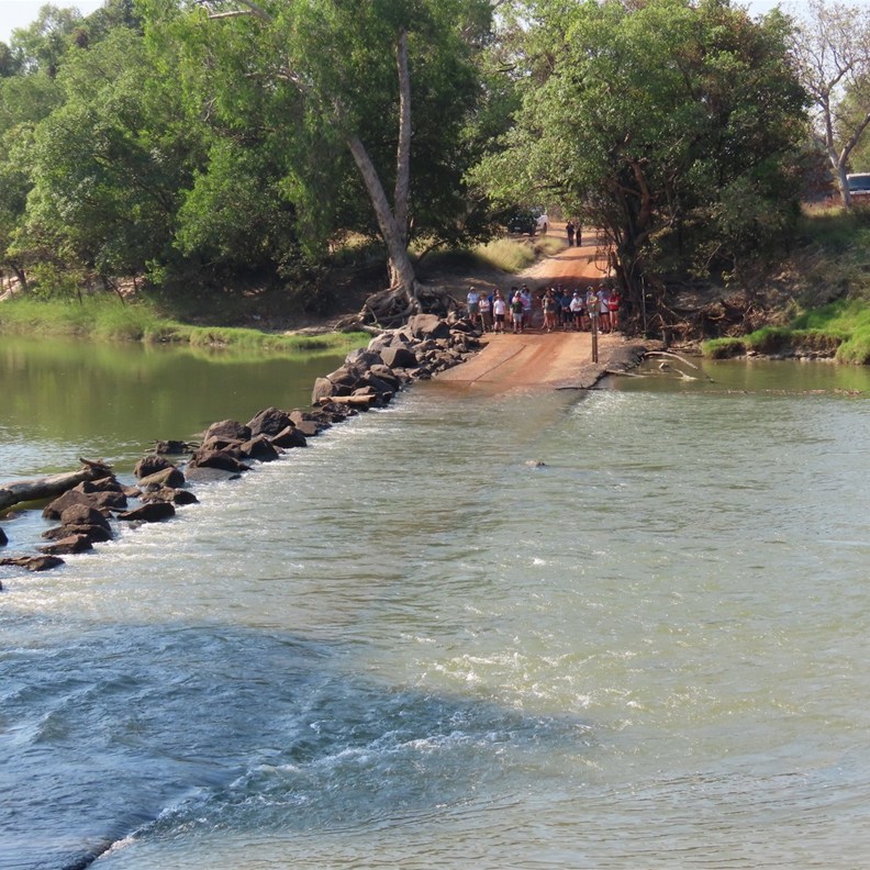 Tourists on the opposite bank on a tour awaiting the show