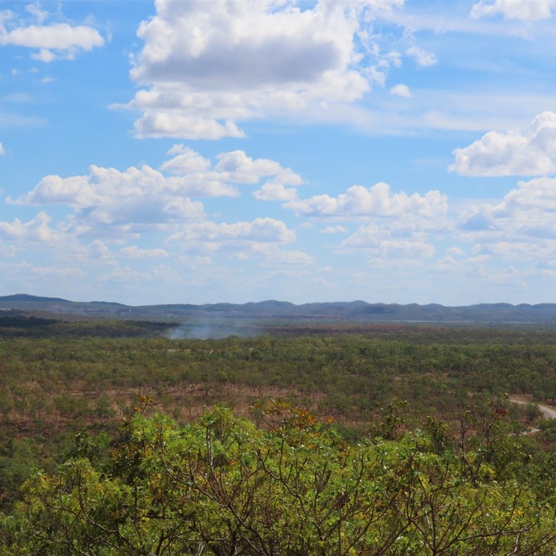 View with small fire burning in distance