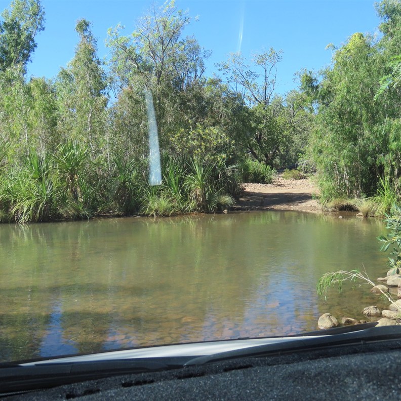 The drive starts with a creek crossing