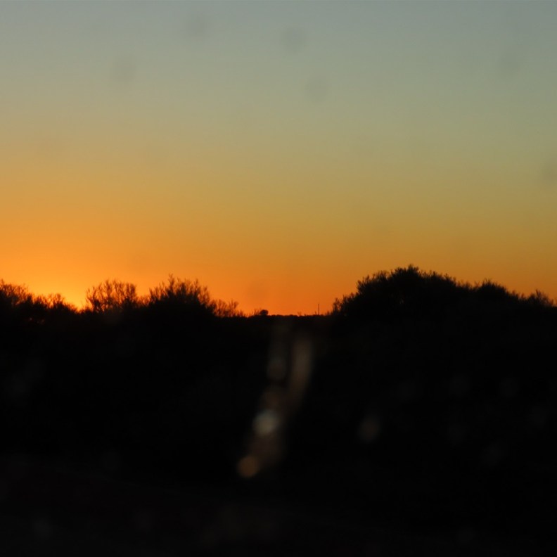 The sun sets as we drive home