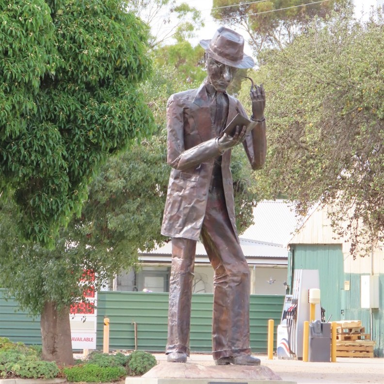Copper Statue of C J Dennis