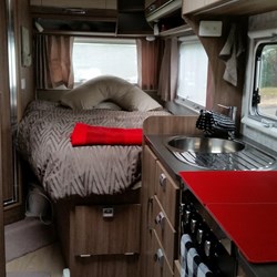 view of my bed and kitchen area