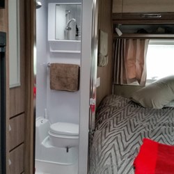 the corner ensuite..compact but enough room for one small person!