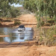 Fording the Lyons River near The Kennedy Ranges