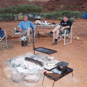 Men asuming the evening fire position