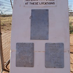 The three plaques in the grader enclosure at Giles