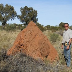 Hugh and one of the large track side termite mounds