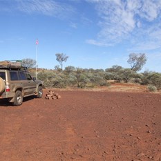The cairn on the western side of the grass plain ( 2231'49.04S 12131'23.22E)