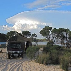 Our campsite with thunder cloud in background