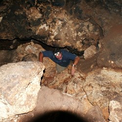Clambering out from the 3rd (lowest) chamber - Empres Spring 2009.