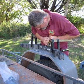 Removing two leafs from the new spring prior to fitment