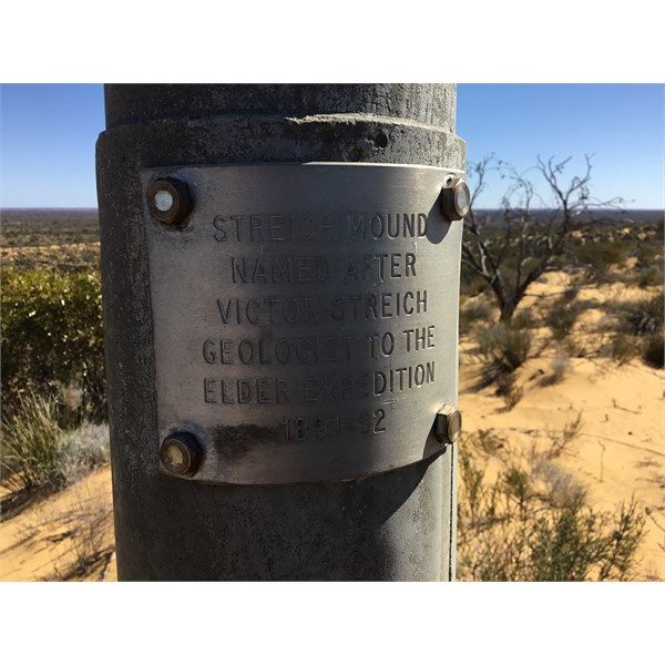 The plaque on the post