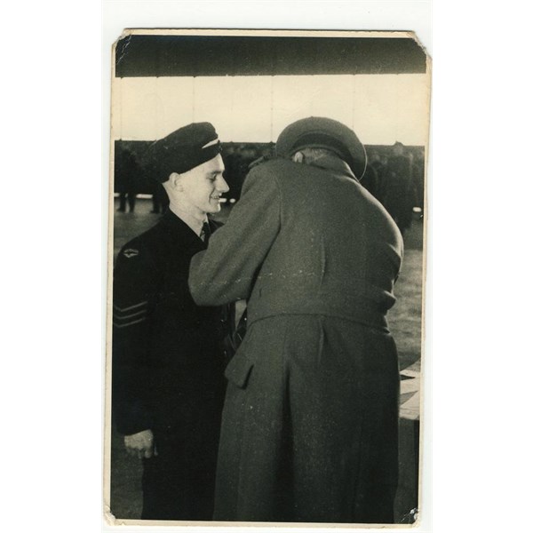 Presented with his wings, Canada.