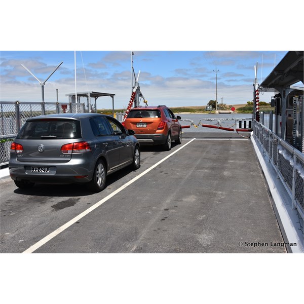 Vehicles on a SA Murray River ferry----and they are free......