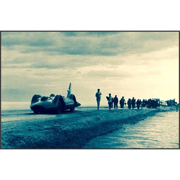 Bluebird and team depart from the salt of Lake Eyre in May 1963 on the causeway from saltpan to road and on to Muloorina Station,