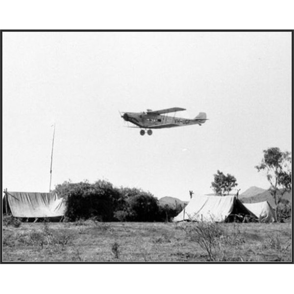 UH-UGF Love Bird flies over camp at Ilbpilla.