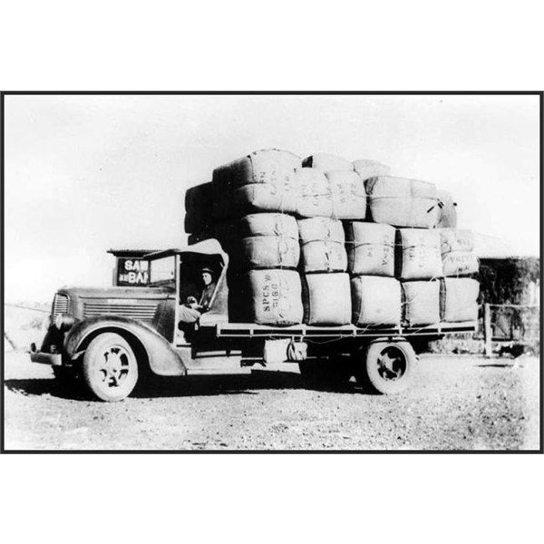 John Bates with a laden truck, Boulia, Queensland, 1940