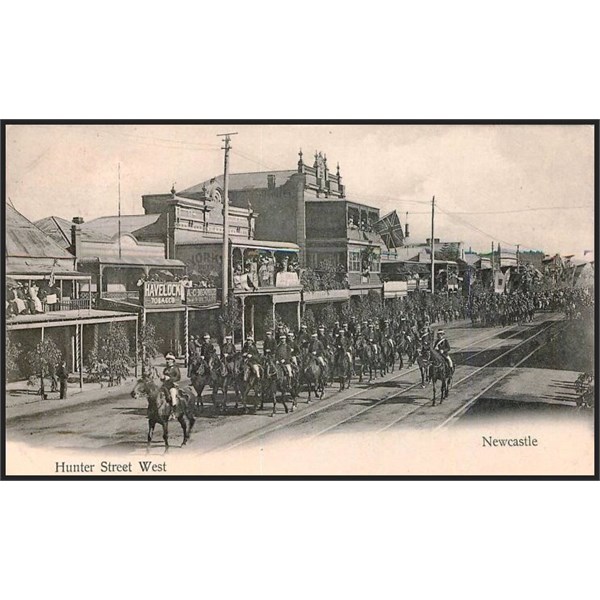 A parade of mounted soldiers along Hunter Street West, c. 1908