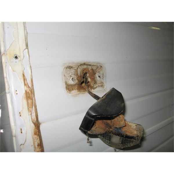 Main culprit, poor sealing (note large hole for wire) 