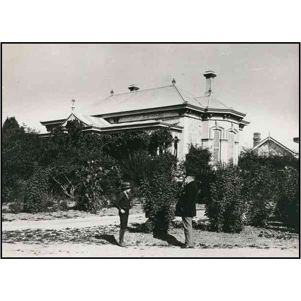 Warrakilla at Mylor, the owner, George Goyder (right) is seen in the garden 1895