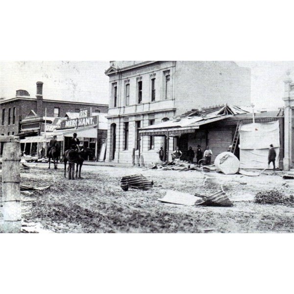 The east side of Victoria Street - Commercial Hotel & billiard room, Smith's fruit shop, Harris store, Commercial Bank