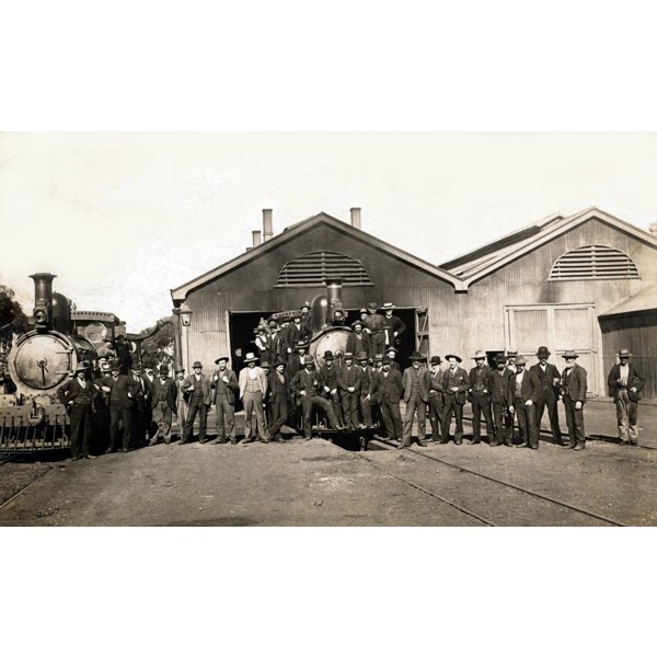 Two Y class locomotives and railway employees pose for photographs at the Quorn locomotive sheds ca. 1890